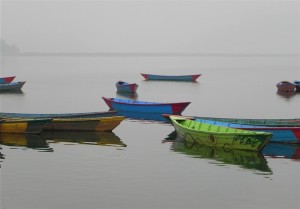 Boats on Phewa Tal by Sherry Knowlton